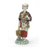 Japanese Kutani porcelain figure of a young girl holding a basket, 32.5cm high : For Further