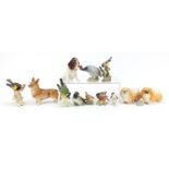 Collectable animals including Royal Doulton peahen, Beswick birds, Royal Copenhagen robin, Goebel