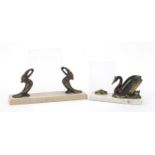 Two French Art Deco marble frames comprising one mounted with two bronzed toucans and one with a