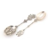 19th century Dutch silver loving spoon with galleon finial, barley twist stem terminating in