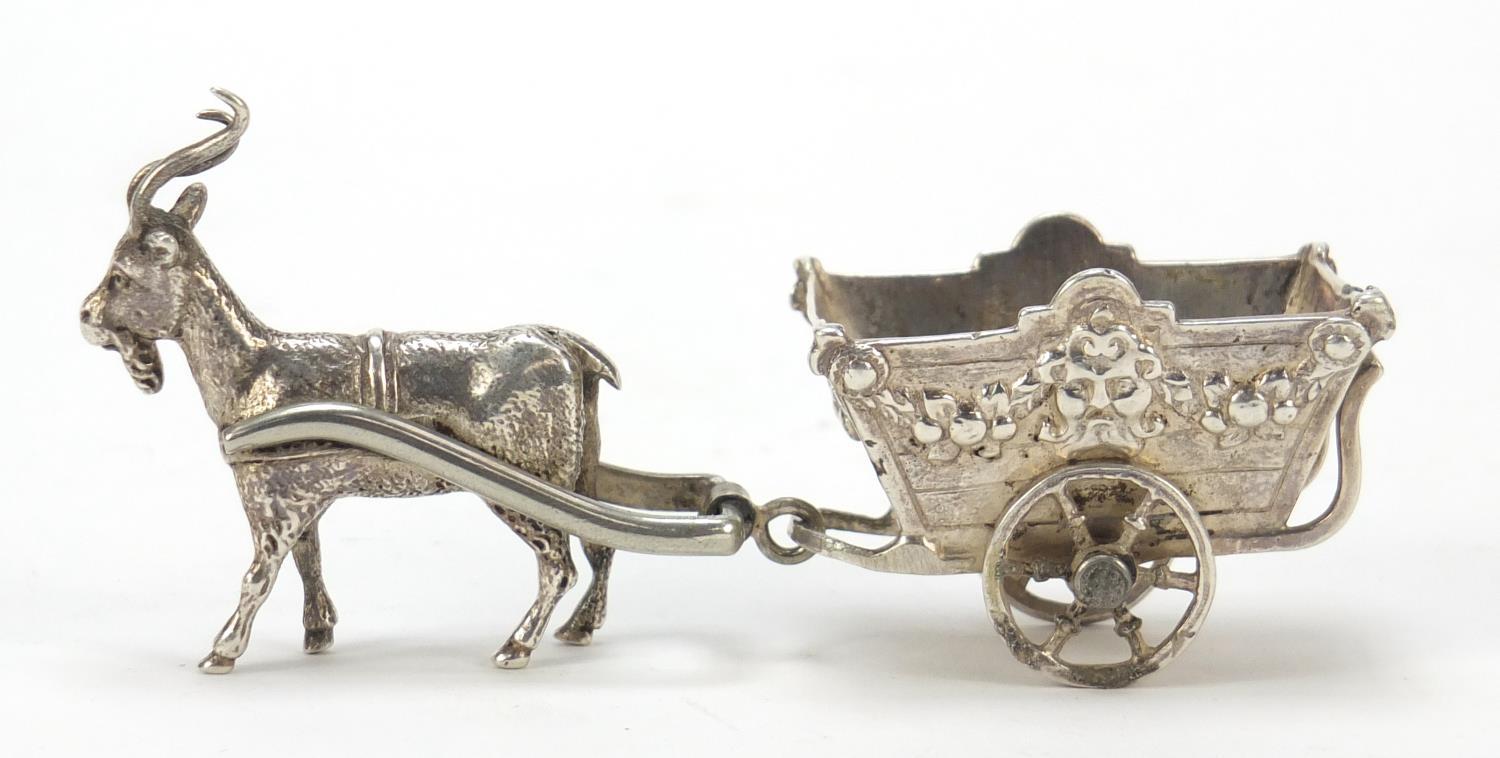 German silver model of goat pulling a cart with rotating wheels, impressed to the base, 11cm in - Image 2 of 8