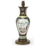 Chinese Canton enamel lamp base of baluster form, hand painted with panels of figures in landscapes,