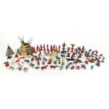 Group of vintage and laterplastic farmyard animals and cowboys and Indians including a Britains