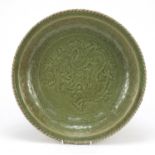 Large Chinese celadon crackle glaze porcelain charger, decorated with a dragon chasing a flaming