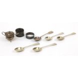 Silver items comprising five teaspoons, lidded mustard pot with spoon and two silver napkin rings,