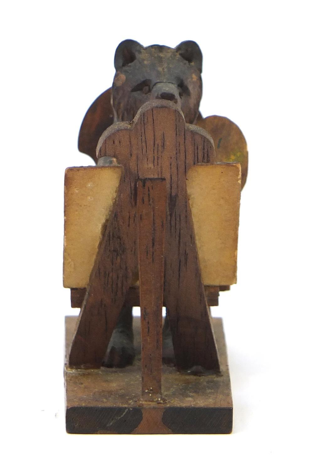 Novelty miniature Black Forest carved wooden bear sat at an easel, 6cm high : For Further - Image 6 of 9