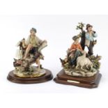 Two Capodimonte figure groups of an artist and the shepherd and shepherdess, the largest 33cm high :