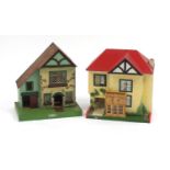 Two vintage doll's houses with furniture including one by Amersham toys, both with labels, the