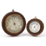 Two carved oak rope twist design wall barometers, the largest 27cm in diameter : For Further