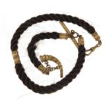 Victorian twisted hair mourning watch chain with gilt metal mounts and T bar, 40cm in length : For