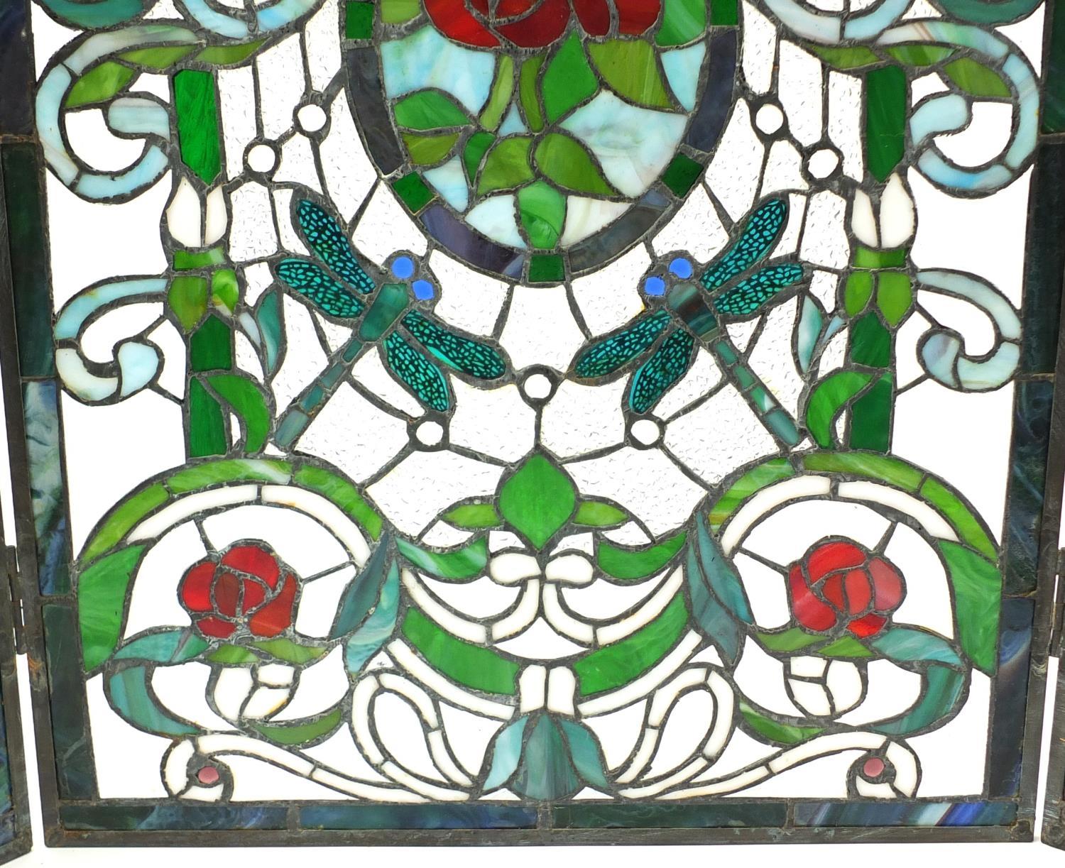Leaded stained glass three fold screen with Art Nouveau floral roundels, 72cm high x 51cm wide - Image 3 of 4