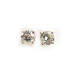 Pair of 14ct white gold diamond solitaire stud earrings, 4mm in diameter, 0.8g : For Further