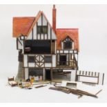 Large hand built Elizabethan design doll's house with furniture and wires for lighting, 100cm H x