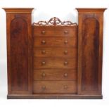 Victorian mahogany compactum wardrobe fitted with six central drawers, flanked on either side by
