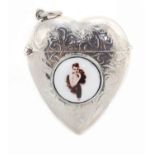 Sterling silver love heart shaped vesta with applied enamel plaque of a pin up, 4.2cm high, 19.