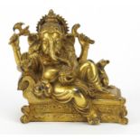 Indian patinated bronze figure of Ganesh, 30cm wide : For Further Condition Reports, Please Visit