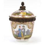 German porcelain pot and cover with gilt metal mounts, hand painted with panels of two lovers and
