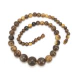 Graduated horn bead necklace, possibly rhinoceros, 58cm in length : For Further Condition Reports,