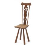 Oak wheel back occasional chair with rose carved seat, 88cm high : For Further Condition Reports,
