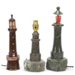 Three lighthouse design table lamps including two carved marble examples, the largest 33.5cm
