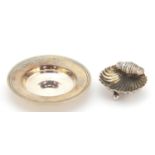 Edward VII silver shell shaped salt and a circular silver dish by Carrs, the largest 8.4cm in