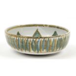 Mid 20th century St Ives pottery bowl painted with flower decoration, marked to base, 27cm : For