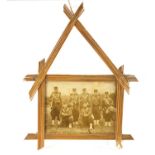 French World War I trench art straw photograph frame with sepia photograph of seven French soldiers,