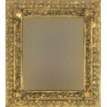Rectangular gilt framed mirror relief decorated with leaves and berries , 49cm x 45cm : For