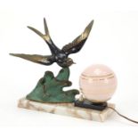 French Art Deco marble desk lamp having globular glass shade mounted with a bronzed bird, 30cm