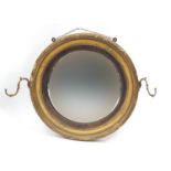 19th century gilt convex mirror with sconces, 72cm in diameter : For Further Condition Reports,