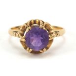 Unmarked yellow metal solitaire amethyst pierced flower head ring, size N 1/2, 2.3g : For Further