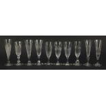 Ten 18th/19th century faceted Champagne flutes, the largest 18.5cm high : For Further Condition