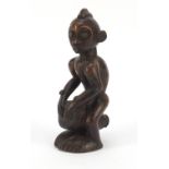 African tribal interest carved wood figure of a drummer from the Congo, 25cm high : For Further