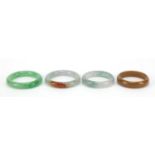 Four Chinese jadeite bangles, the largest 8cm in diameter : For Further Condition Reports, Please