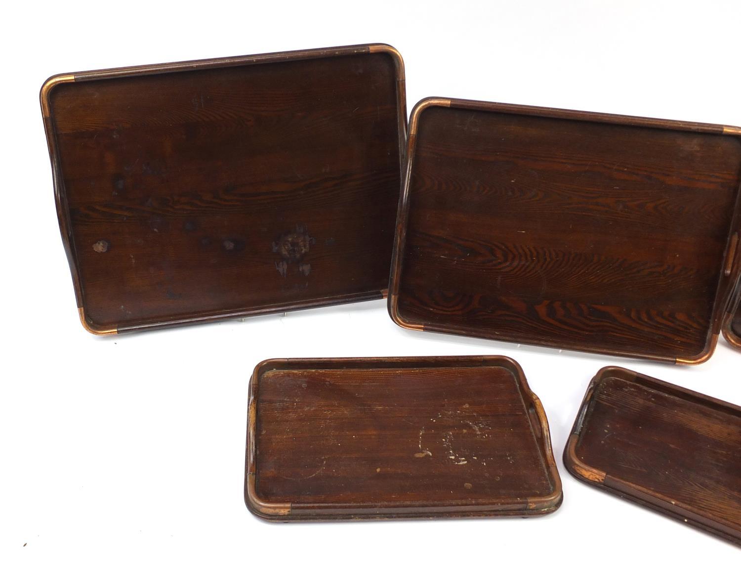 Graduated set of five oak trays with copper mounts, the largest 62cm x 44cm : For Further - Image 2 of 6