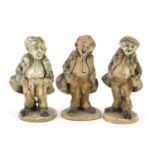 Three Norman Hill studio pottery models of gentlemen, each signed and with impressed marks, the
