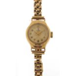 Ladies 9ct gold Tudor (Rolex) wristwatch with 9ct gold strap, box and paperwork, 16mm in diameter,