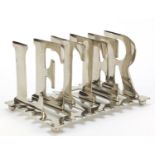 Novelty chromed 'letter' letter rack, 20.5cm wide : For Further Condition Reports Please Visit Our