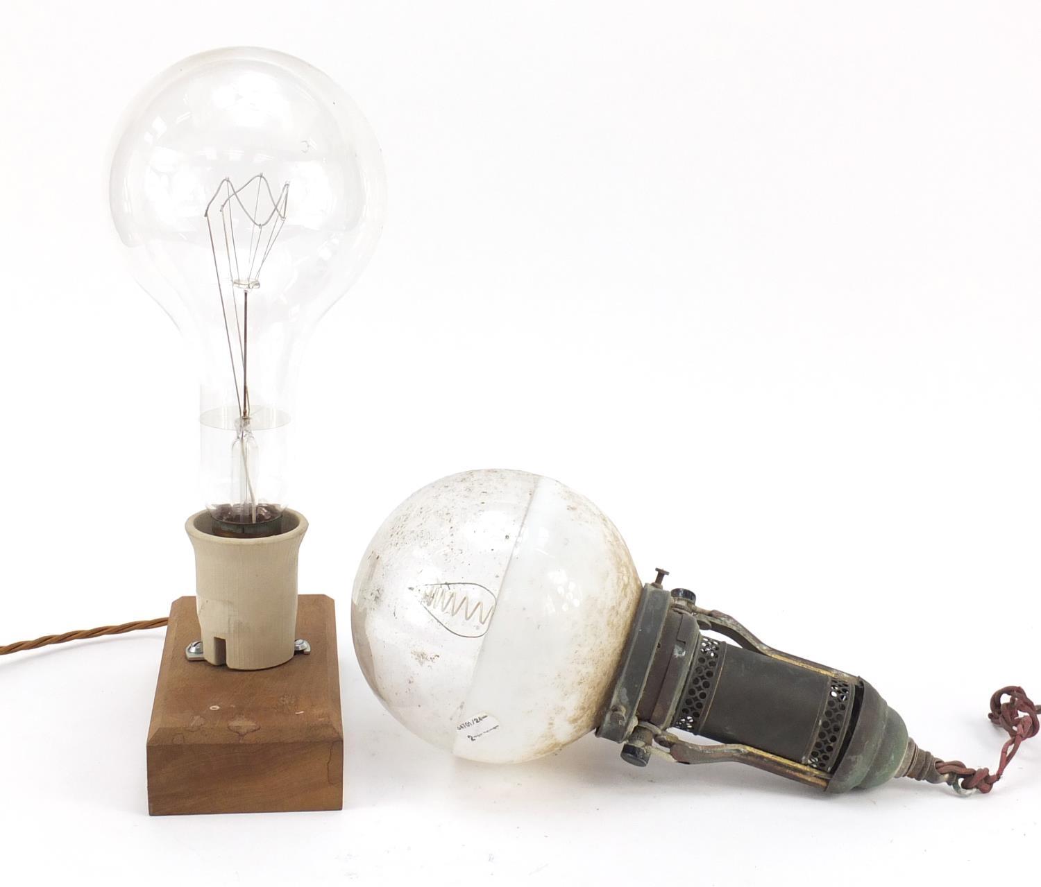 Two large Industrial style bulbs, one on a gimbal support, the other mounted on a wooden block, - Image 2 of 7