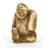 Japanese carved ivory Netsuke of seated gentleman, 4cm high : For Further Condition Reports Please