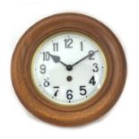 Oak cased eight day wall clock with Arabic numerals, 35.5cm in diameter : For Further Condition