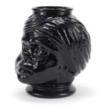 American black glass cookie jar in the form of a lady, 20cm high : For Further Condition Reports