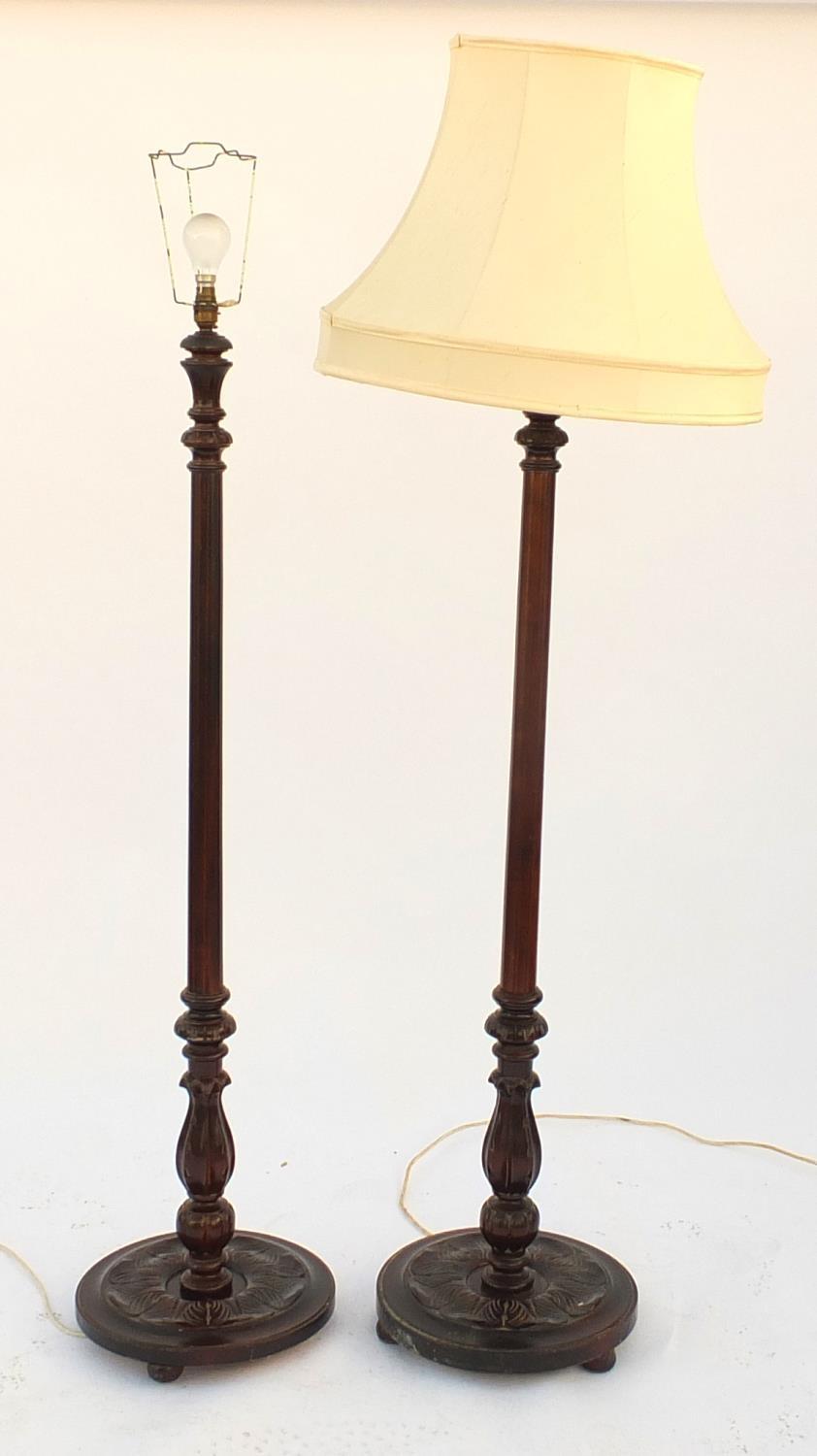 Pair of carved mahogany standard lamps, one with shade, each 130cm high excluding the fitting : - Image 2 of 2