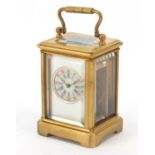 Miniature gilt brass cased carriage clock with Roman and Arabic numerals, 6cm high : For Further