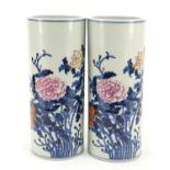 Pair of Chinese porcelain vases hand painted with flowers, six figure character marks to the base,