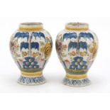 Pair of 18th century Dutch Delft baluster vases hand painted with flowers, each 16cm high : For