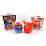 Two Furbies with boxes, the largest 15cm high : For Further Condition Reports Please Visit Our