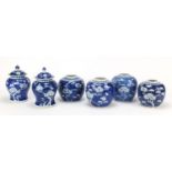 Four Chinese blue and white porcelain ginger jars and a pair of baluster vases with covers, each
