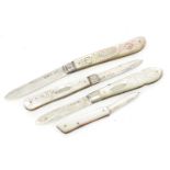 Four Victorian and later silver and mother of pearl folding fruit knives, various Sheffield and