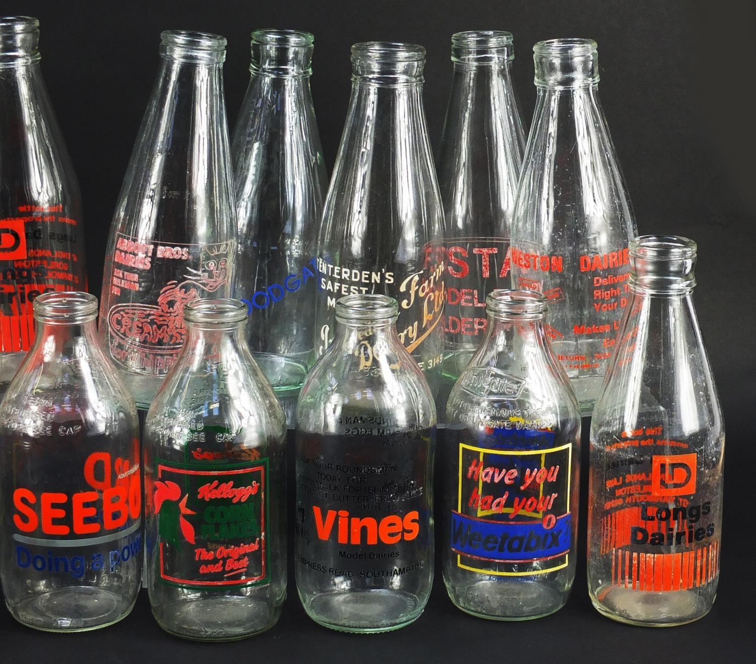 Collection of advertising milk bottles, each 18cm high : For Further Condition Reports Please - Image 6 of 6